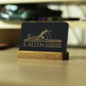 A card stand holding and displaying several business cards